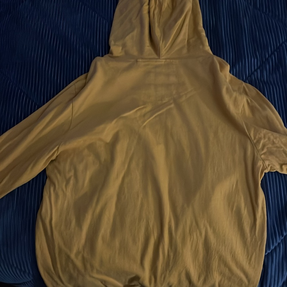 I am selling a high quality yellow hoodie with drawstring’s size small for $25
